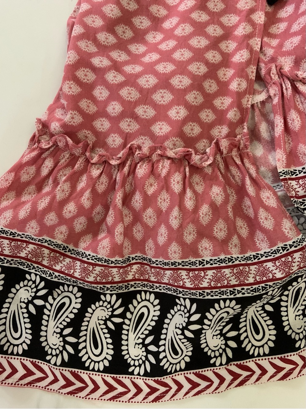 Coral and cream Printed Wrap Dress with Black Patterned Sash and bottom ruffle - Picture 4 of 5